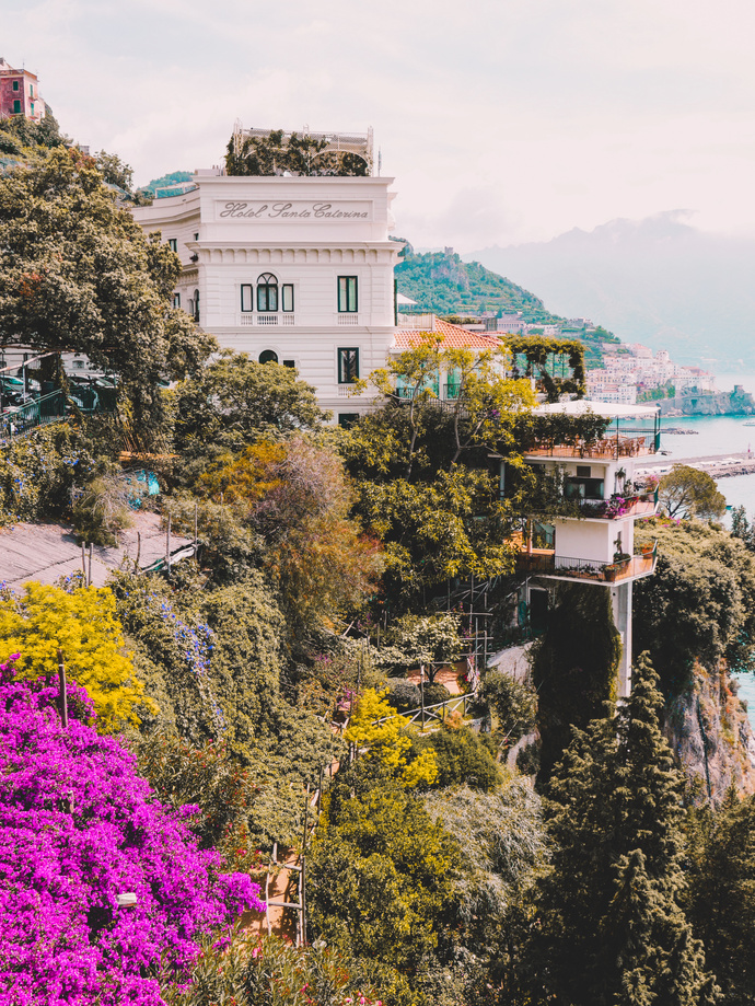 Building With Vines and Canopy in a Distance of Body of Water